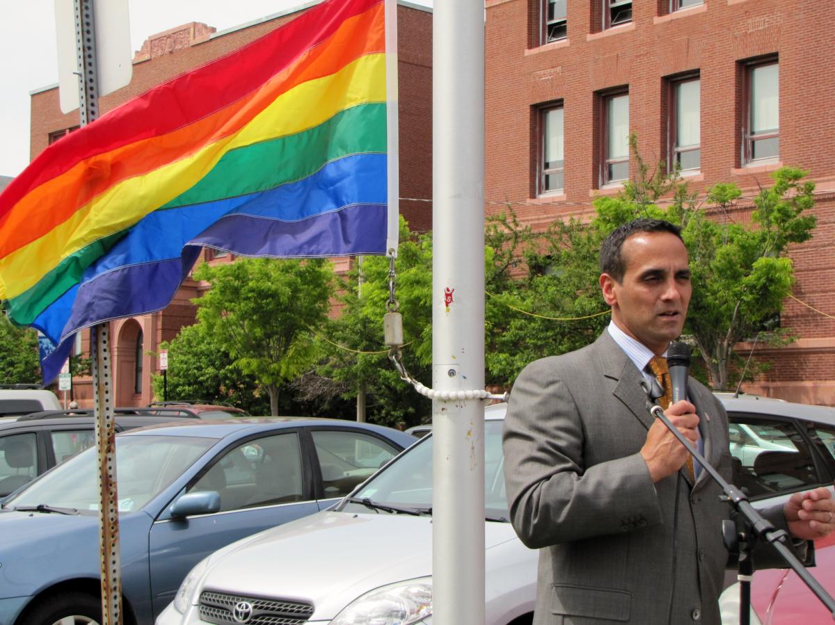 Mayor Joseph A. Curtatone presides over the raising of the Pride Flag.
